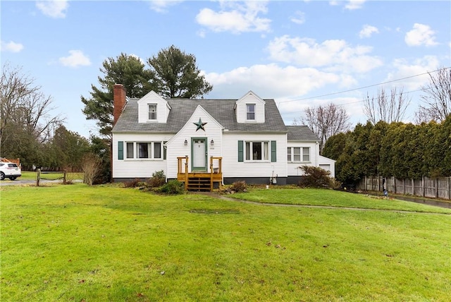 new england style home with a front yard