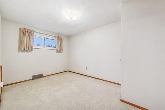 unfurnished room with carpet