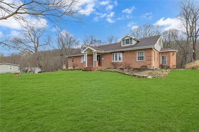 view of front of property with a front lawn