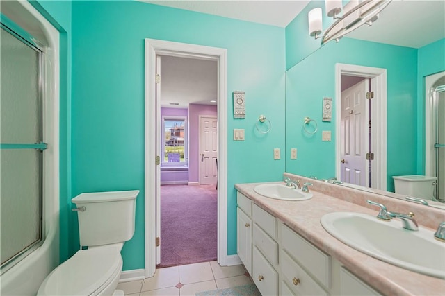 full bathroom featuring a notable chandelier, tile patterned floors, bath / shower combo with glass door, toilet, and vanity