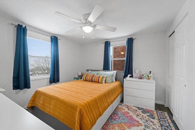 bedroom featuring a closet and ceiling fan