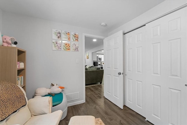 living area featuring dark hardwood / wood-style floors