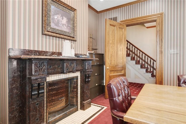 home office with crown molding and carpet