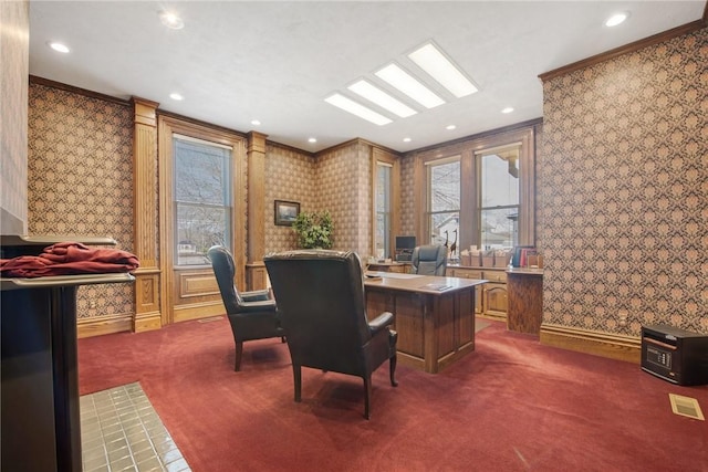 carpeted home office with crown molding