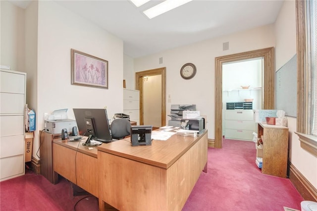 office area with visible vents and carpet