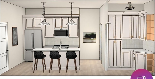 kitchen with light countertops, tasteful backsplash, a sink, light wood finished floors, and stainless steel appliances