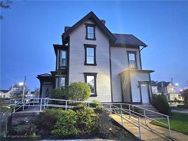 view of front of property featuring fence and a chimney