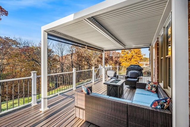 deck with an outdoor fire pit