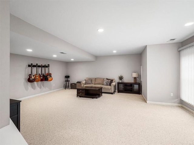 living room with carpet flooring and a wealth of natural light