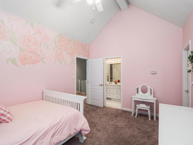 bedroom featuring carpet flooring, ceiling fan, beamed ceiling, high vaulted ceiling, and ensuite bathroom