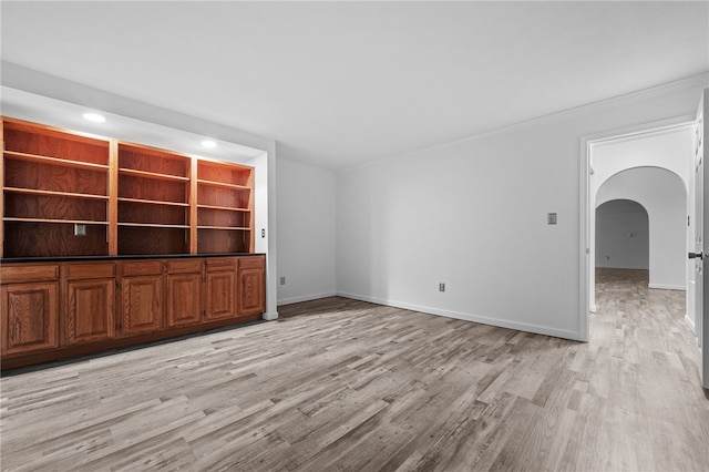 unfurnished living room featuring light hardwood / wood-style flooring