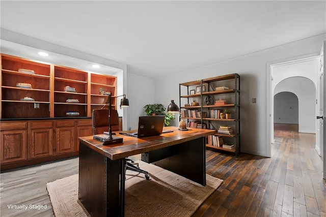 office area with hardwood / wood-style floors