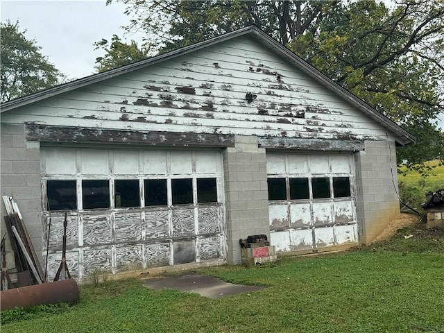 garage with a yard