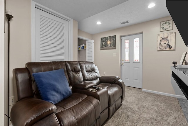 living room with light colored carpet