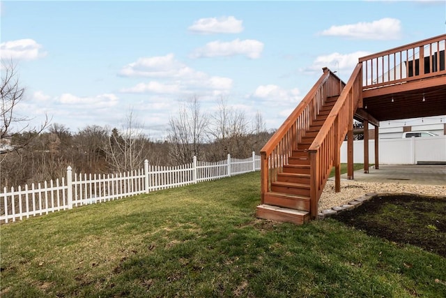 view of yard featuring a deck and a patio area