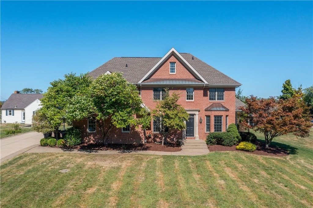 view of front of home with a front yard