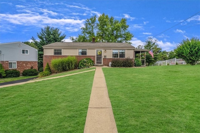 view of front of property with a front lawn