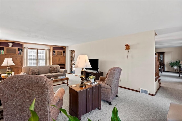 living room featuring light colored carpet