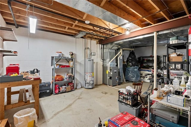 basement with gas water heater and heating unit