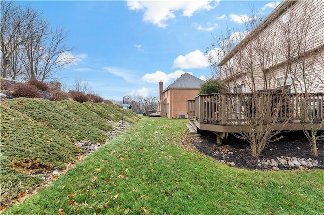 view of yard featuring a deck