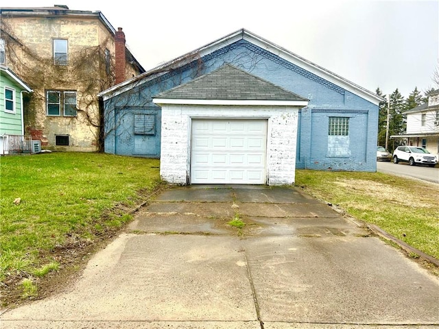 exterior space with a yard and central AC