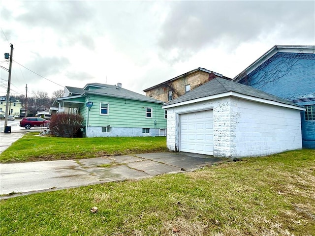 view of side of property with a yard