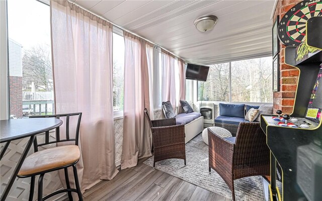 sunroom with wood ceiling