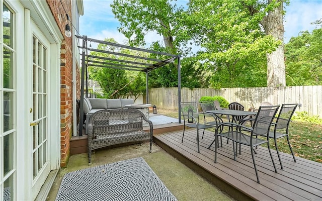 wooden balcony featuring outdoor lounge area, a pergola, and a wooden deck