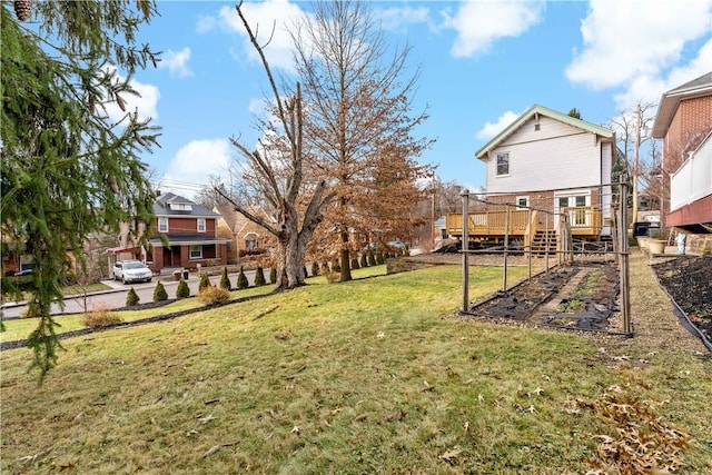 view of yard with a deck