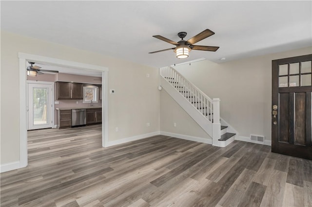 entrance foyer with hardwood / wood-style flooring and ceiling fan