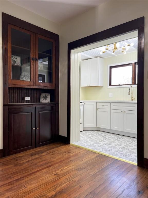 interior space featuring hardwood / wood-style flooring and sink