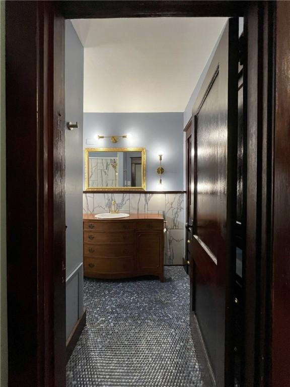 bathroom featuring tile patterned floors and vanity