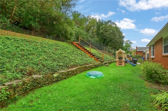 view of yard with a playground