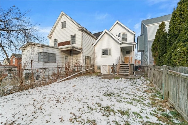 view of snow covered house