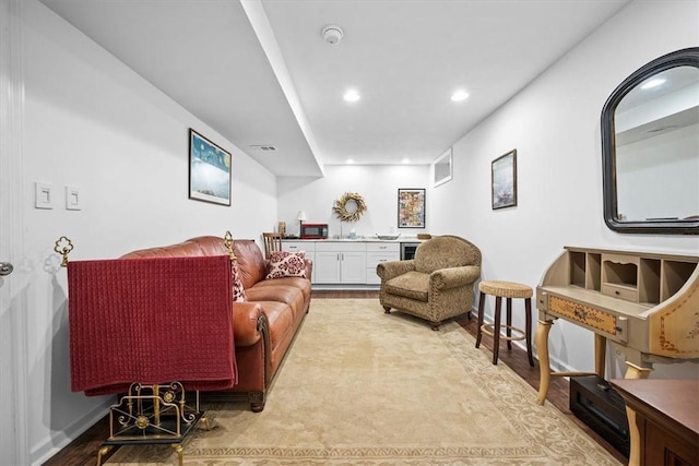 living room with light hardwood / wood-style floors