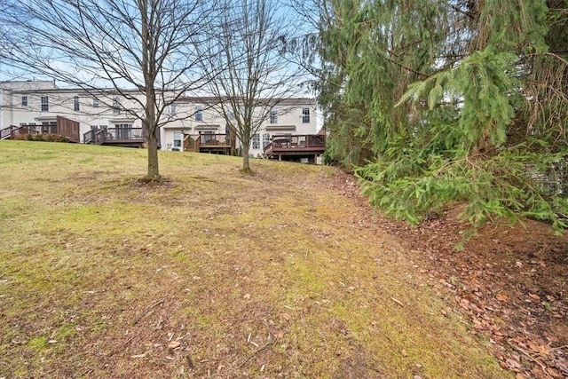 view of yard featuring a deck