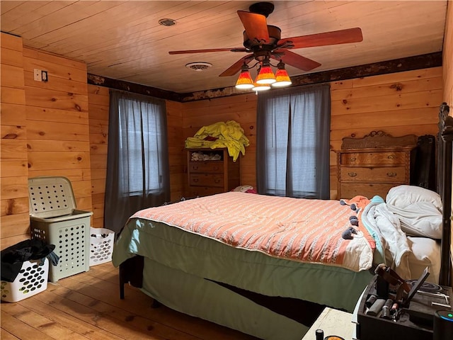 230 Gastown Rd, Plumcreek Twp, PA 15774 - bedroom featuring wood walls, hardwood / wood-style flooring, wood ceiling, and a ceiling fan