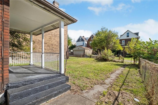 view of yard featuring a porch