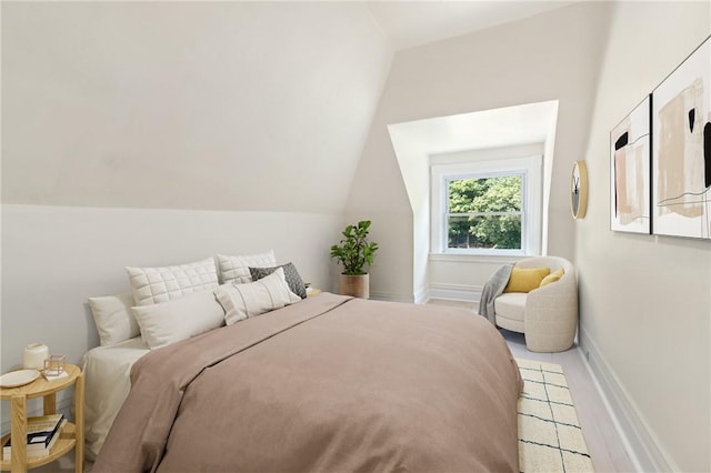 bedroom with vaulted ceiling