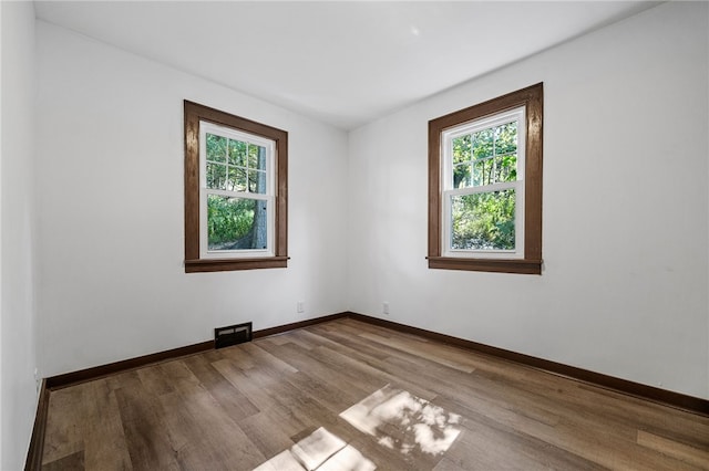 empty room with light wood-type flooring