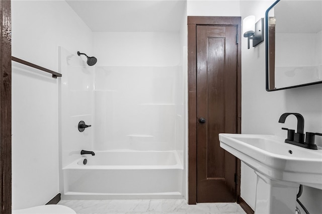 bathroom with  shower combination and sink