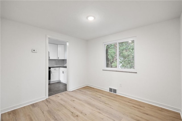 empty room featuring light wood-type flooring