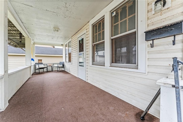 view of patio featuring a porch