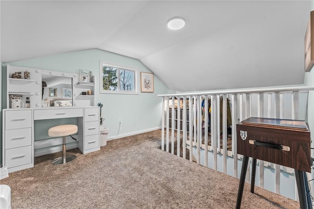 office with carpet floors and lofted ceiling