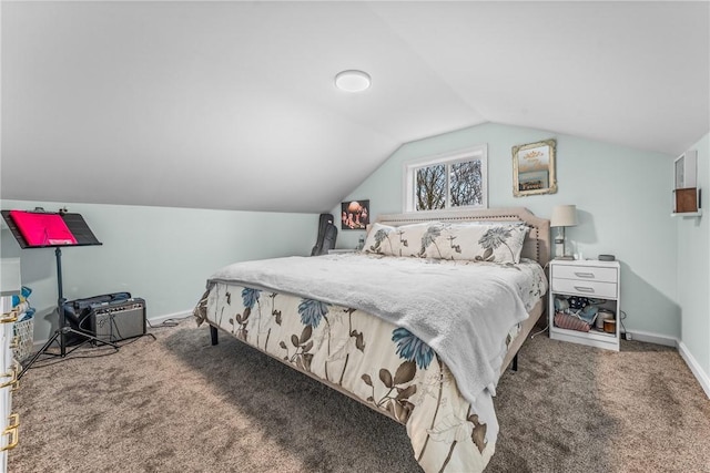 carpeted bedroom featuring lofted ceiling