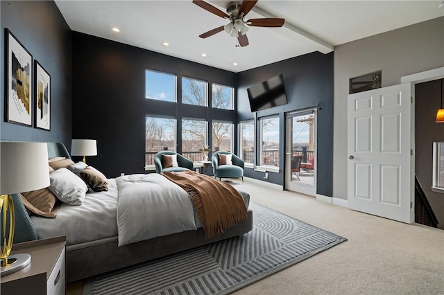 bedroom featuring carpet, access to exterior, and ceiling fan