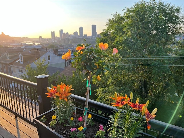 view of balcony at dusk