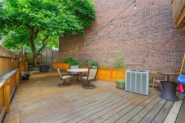 deck featuring central air condition unit