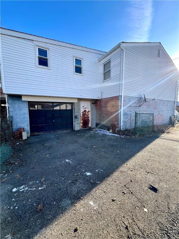 exterior space with a garage