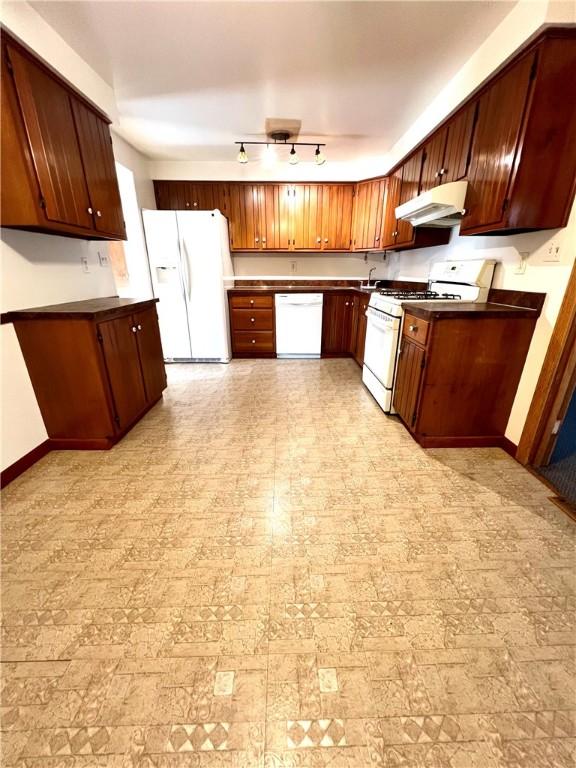 kitchen featuring white appliances